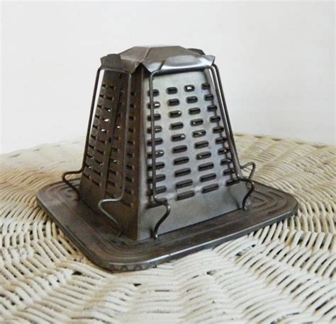 antique round metal toaster for wood or gas stoves